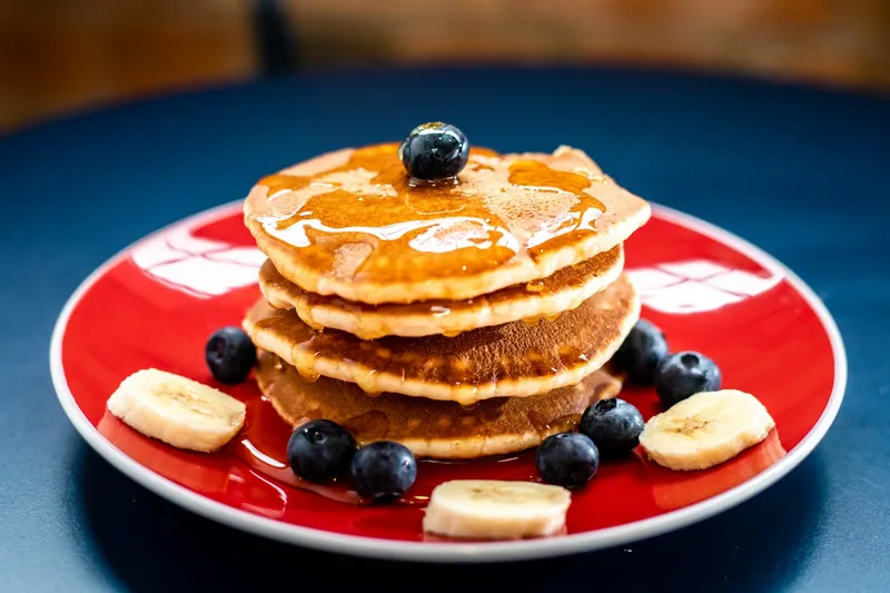 Stack of cottage cheese protein pancakes with berries