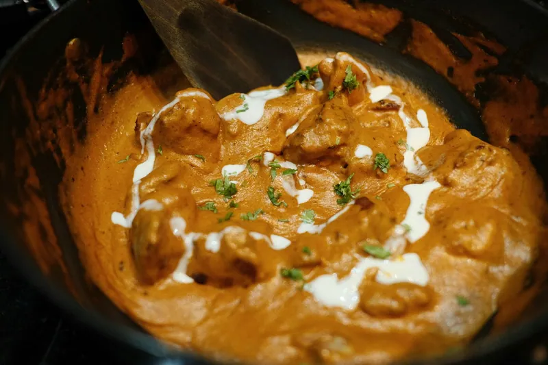 Chickpea coconut curry with rice and herbs