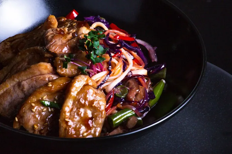 Asian-style meat and cabbage stir-fry in a bowl