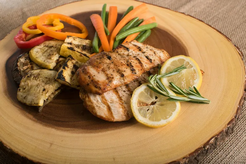 Chicken cutlets and green beans in lemon butter sauce